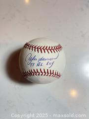 MaxSold Auction: ANDRE DAWSON Autographed MLB Baseball with "77 NL ROY" Inscription - Hall of Famer! - Parker (Colorado, USA) SELLER MANAGED Commercial Liquidation Online Auction - Heritage Oak Drive