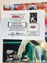 MaxSold Auction: GARRETT ATKINS Autographed Colorado Rockies 8x10 Photo - 2007 NL Champs! - Parker (Colorado, USA) SELLER MANAGED Commercial Liquidation Online Auction - Heritage Oak Drive