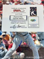 MaxSold Auction: GARRETT ATKINS Autographed Colorado Rockies 8x10 Photo - 2007 NL Champs! - Parker (Colorado, USA) SELLER MANAGED Commercial Liquidation Online Auction - Heritage Oak Drive
