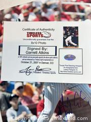 MaxSold Auction: GARRETT ATKINS Autographed Colorado Rockies 8x10 Photo - 2007 NL Champs! - Parker (Colorado, USA) SELLER MANAGED Commercial Liquidation Online Auction - Heritage Oak Drive