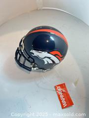 MaxSold Auction: JASON ELAM Autographed Denver Broncos Mini Helmet - Back to Back SB Champ and Ring of Famer! - Parker (Colorado, USA) SELLER MANAGED Commercial Liquidation Online Auction - Heritage Oak Drive