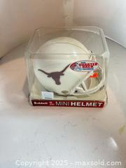 MaxSold Auction: TEXAS LONGHORNS Unsigned Riddell Mini Helmet - Parker (Colorado, USA) SELLER MANAGED Commercial Liquidation Online Auction - Heritage Oak Drive