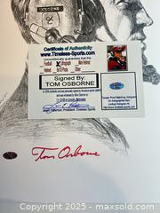 MaxSold Auction: TOM OSBORNE - NEBRASKA HUSKERS Signed Lithograph/Print - 3 Time National Champion Coach - Parker (Colorado, USA) SELLER MANAGED Commercial Liquidation Online Auction - Heritage Oak Drive
