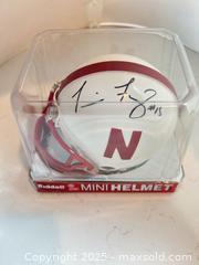 MaxSold Auction: TOMMIE FRAZIER Autographed Nebraska Cornhuskers Mini Helmet - National Champion! - Parker (Colorado, USA) SELLER MANAGED Commercial Liquidation Online Auction - Heritage Oak Drive