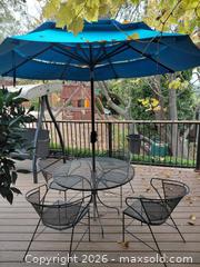 MaxSold Auction: Patio Table with 4 Chairs & Umbrella - Fair Oaks (California, USA) PARTNER MANAGED Moving Online Auction - Cocoa Palm Way
