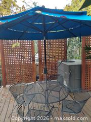 MaxSold Auction: Patio Table with 4 Chairs & Umbrella - Fair Oaks (California, USA) PARTNER MANAGED Moving Online Auction - Cocoa Palm Way
