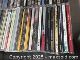 MaxSold Auction: CDs A - Kingston (Ontario, Canada) PARTNER MANAGED Downsizing Online Auction - County Road 38, Elginburg (STORAGE)