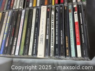 MaxSold Auction: CDs A - Kingston (Ontario, Canada) PARTNER MANAGED Downsizing Online Auction - County Road 38, Elginburg (STORAGE)