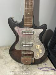MaxSold Auction: Electric Guitar A - Kingston (Ontario, Canada) PARTNER MANAGED Downsizing Online Auction - County Road 38, Elginburg (STORAGE)