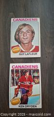 MaxSold Auction: 1975 OPC Lafleur and Dryden Hockey Cards - Kingston (Ontario, Canada) SELLER MANAGED Downsizing Online Auction - Birchwood Drive
