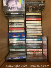 MaxSold Auction: Large box of cassettes and CDs  - Vancouver (British Columbia, Canada) SELLER MANAGED Downsizing Online Auction - West Broadway (CONDO)
