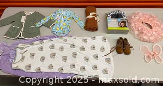 MaxSold Auction: Selection of New and uses kids swaddles and clothing  - Vancouver (British Columbia, Canada) SELLER MANAGED Downsizing Online Auction - West Broadway (CONDO)
