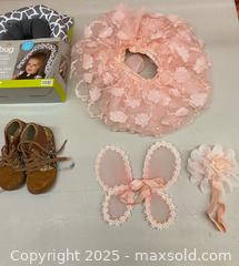 MaxSold Auction: Selection of New and uses kids swaddles and clothing  - Vancouver (British Columbia, Canada) SELLER MANAGED Downsizing Online Auction - West Broadway (CONDO)