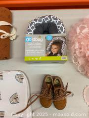 MaxSold Auction: Selection of New and uses kids swaddles and clothing  - Vancouver (British Columbia, Canada) SELLER MANAGED Downsizing Online Auction - West Broadway (CONDO)