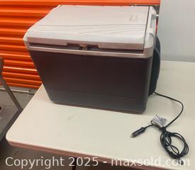 MaxSold Auction: The item shown is a Coleman 40-Quart PowerChill Thermoelectric Cooler - Vancouver (British Columbia, Canada) SELLER MANAGED Downsizing Online Auction - West Broadway (CONDO)