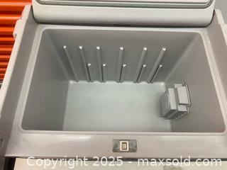 MaxSold Auction: The item shown is a Coleman 40-Quart PowerChill Thermoelectric Cooler - Vancouver (British Columbia, Canada) SELLER MANAGED Downsizing Online Auction - West Broadway (CONDO)