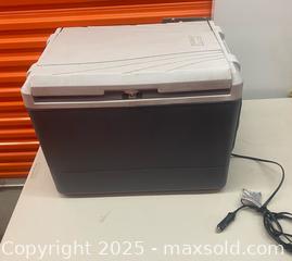 MaxSold Auction: The item shown is a Coleman 40-Quart PowerChill Thermoelectric Cooler - Vancouver (British Columbia, Canada) SELLER MANAGED Downsizing Online Auction - West Broadway (CONDO)