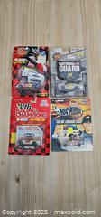 MaxSold Auction: Lot of 4 Vintage Nascar cars  various racers  - Thorold (Ontario, Canada) SELLER MANAGED Downsizing Online Auction - Carleton Street North