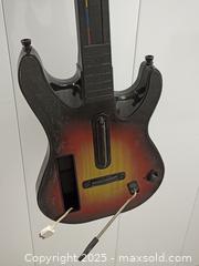 MaxSold Auction: Guitar Hero World Tour Controller - Toronto (Ontario, Canada) SELLER MANAGED Downsizing Online Auction - Torbarrie Road (STORAGE)