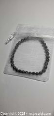 MaxSold Auction: Natural rainbow obsidian bracelet  - Hamilton (Ontario, Canada) PARTNER MANAGED Reseller Online Auction - Mohawk Road West