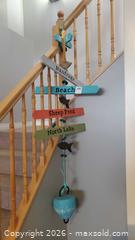 MaxSold Auction: Nautical Beach Directional Wall Hanging with Buoy A - Ottawa (Ontario, Canada) PARTNER MANAGED Downsizing Online Auction - Sablewood Place