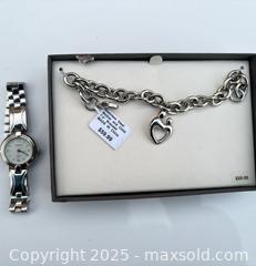 MaxSold Auction: Geneva Ladies Silver-Tone Quartz Watch with Charm Bracelet - Decatur (Georgia, USA) SELLER MANAGED Moving Online Auction - Snapfinger Woods Drive (STORAGE)