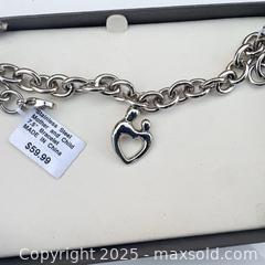 MaxSold Auction: Geneva Ladies Silver-Tone Quartz Watch with Charm Bracelet - Decatur (Georgia, USA) SELLER MANAGED Moving Online Auction - Snapfinger Woods Drive (STORAGE)