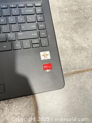 MaxSold Auction: HP 14-dk1003dx Laptop, AMD Athlon Silver, AMD Radeon Tested &#38; Ready - Decatur (Georgia, USA) SELLER MANAGED Moving Online Auction - Snapfinger Woods Drive (STORAGE)