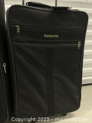 MaxSold Auction: Travelpro Large Luggage and Samsonite Carry-On Suitcase - Aurora (Ontario, Canada) SELLER MANAGED Moving Online Auction - Goulding Avenue (STORAGE)