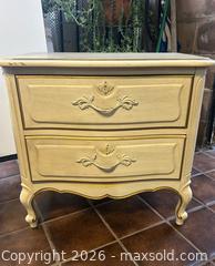 MaxSold Auction: Furniture Duo: White 2-Drawer Nightstand & Ornate Wooden Accent Table - Los Angeles (California, USA) SELLER MANAGED Reseller Online Auction - Devonshire Street