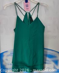MaxSold Auction: Romeo & Juliet Couture Green Top – Size Medium - Los Angeles (California, USA) SELLER MANAGED Reseller Online Auction - Devonshire Street