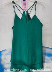 MaxSold Auction: Romeo & Juliet Couture Green Top – Size Medium - Los Angeles (California, USA) SELLER MANAGED Reseller Online Auction - Devonshire Street