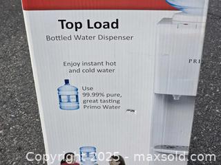 MaxSold Auction: Brand new primo top load bottled water dispenser  - Sun City (Arizona, USA) PARTNER MANAGED Downsizing Online Auction - North 107th Ave