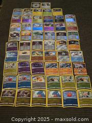 MaxSold Auction: Pokemon holo cards lot - Sun City (Arizona, USA) PARTNER MANAGED Downsizing Online Auction - North 107th Ave