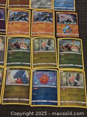 MaxSold Auction: Pokemon holo cards lot - Sun City (Arizona, USA) PARTNER MANAGED Downsizing Online Auction - North 107th Ave