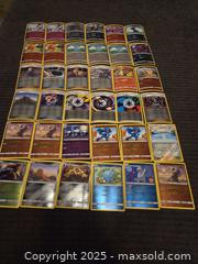 MaxSold Auction: Pokemon holo cards lot - Sun City (Arizona, USA) PARTNER MANAGED Downsizing Online Auction - North 107th Ave