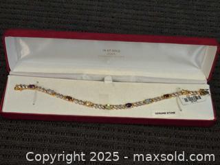 MaxSold Auction: Pretty 18k over sterling silver tennis braceoet  - Sun City (Arizona, USA) PARTNER MANAGED Downsizing Online Auction - North 107th Ave