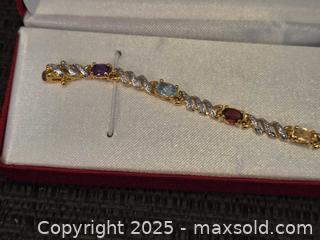 MaxSold Auction: Pretty 18k over sterling silver tennis braceoet  - Sun City (Arizona, USA) PARTNER MANAGED Downsizing Online Auction - North 107th Ave