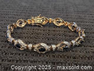 MaxSold Auction: Pretty sterling silver tennis bracelet  - Sun City (Arizona, USA) PARTNER MANAGED Downsizing Online Auction - North 107th Ave