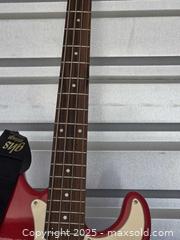 MaxSold Auction: Squier by fender bass guitar - Sun City (Arizona, USA) PARTNER MANAGED Downsizing Online Auction - North 107th Ave