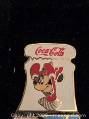 MaxSold Auction: Unique disney coca cola bottle pin set - Sun City (Arizona, USA) PARTNER MANAGED Downsizing Online Auction - North 107th Avenue