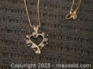 MaxSold Auction: Very pretty sterling heart necklace  - Sun City (Arizona, USA) PARTNER MANAGED Downsizing Online Auction - North 107th Avenue