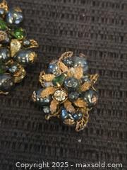 MaxSold Auction: Vintage demario NY brooch and single earring - Sun City (Arizona, USA) PARTNER MANAGED Downsizing Online Auction - North 107th Ave