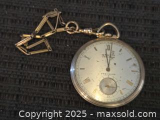 MaxSold Auction: Vintage gruen veri-thin pocketeatch  - Sun City (Arizona, USA) PARTNER MANAGED Downsizing Online Auction - North 107th Ave