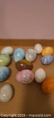 MaxSold Auction: Lot of 11–20 Polished Decorative Egg-Shaped Stones - San Jose (California, USA) SELLER MANAGED Downsizing Online Auction - Paladin Drive