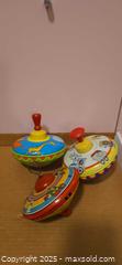 MaxSold Auction: Vintage lithographed tin wind-up spinning tops, lot of 3 - San Jose (California, USA) SELLER MANAGED Downsizing Online Auction - Paladin Drive
