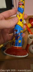 MaxSold Auction: Vintage Tin Noisemaker Horns, Lot of 4 - San Jose (California, USA) SELLER MANAGED Downsizing Online Auction - Paladin Drive