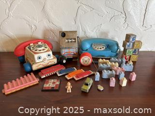 MaxSold Auction: Assorted Vintage Toys: Fisher Price Chatter Phone, Reno Nevada Slot Machine, & More! - San Francisco (California, USA) SELLER MANAGED Estate Sale Online Auction - Kenwood Way