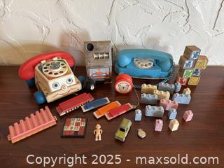 MaxSold Auction: Assorted Vintage Toys: Fisher Price Chatter Phone, Reno Nevada Slot Machine, & More! - San Francisco (California, USA) SELLER MANAGED Estate Sale Online Auction - Kenwood Way
