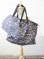 MaxSold Auction: 2 Pcs Coach Large Leopard Print Weekender Tote - Toronto (Ontario, Canada) PARTNER MANAGED Downsizing Online Auction - Research Road (STORAGE)